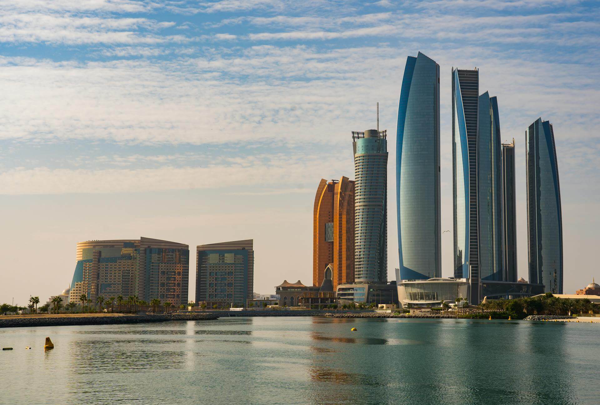 Modern Abu Dhabi skyline with Etihad Towers, perfect for your successful Business Setup in Abu Dhabi services.