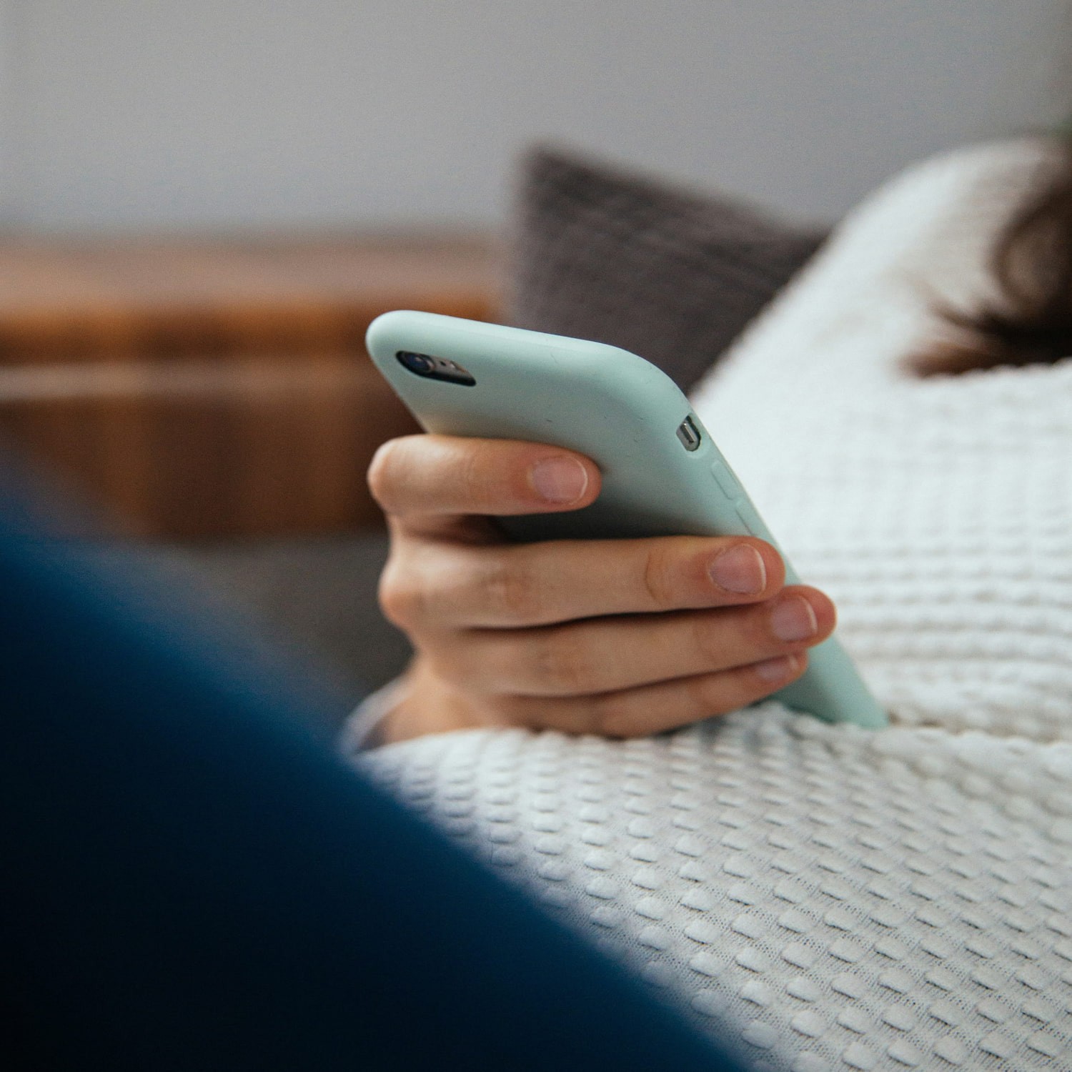 Person Online Shopping on iPhone