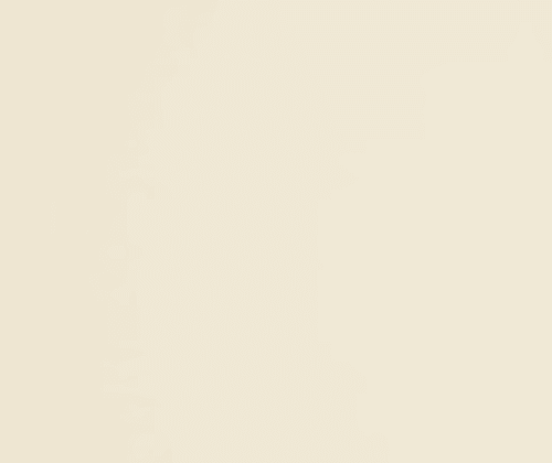 A soft, warm off-white with subtle beige undertones. It reflects a good amount of light, making spaces feel airy and open without being stark or clinical
