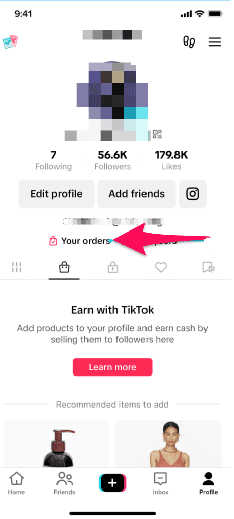 TikTok profile screen with an arrow pointing to the "Product showcase" tab for displaying products.