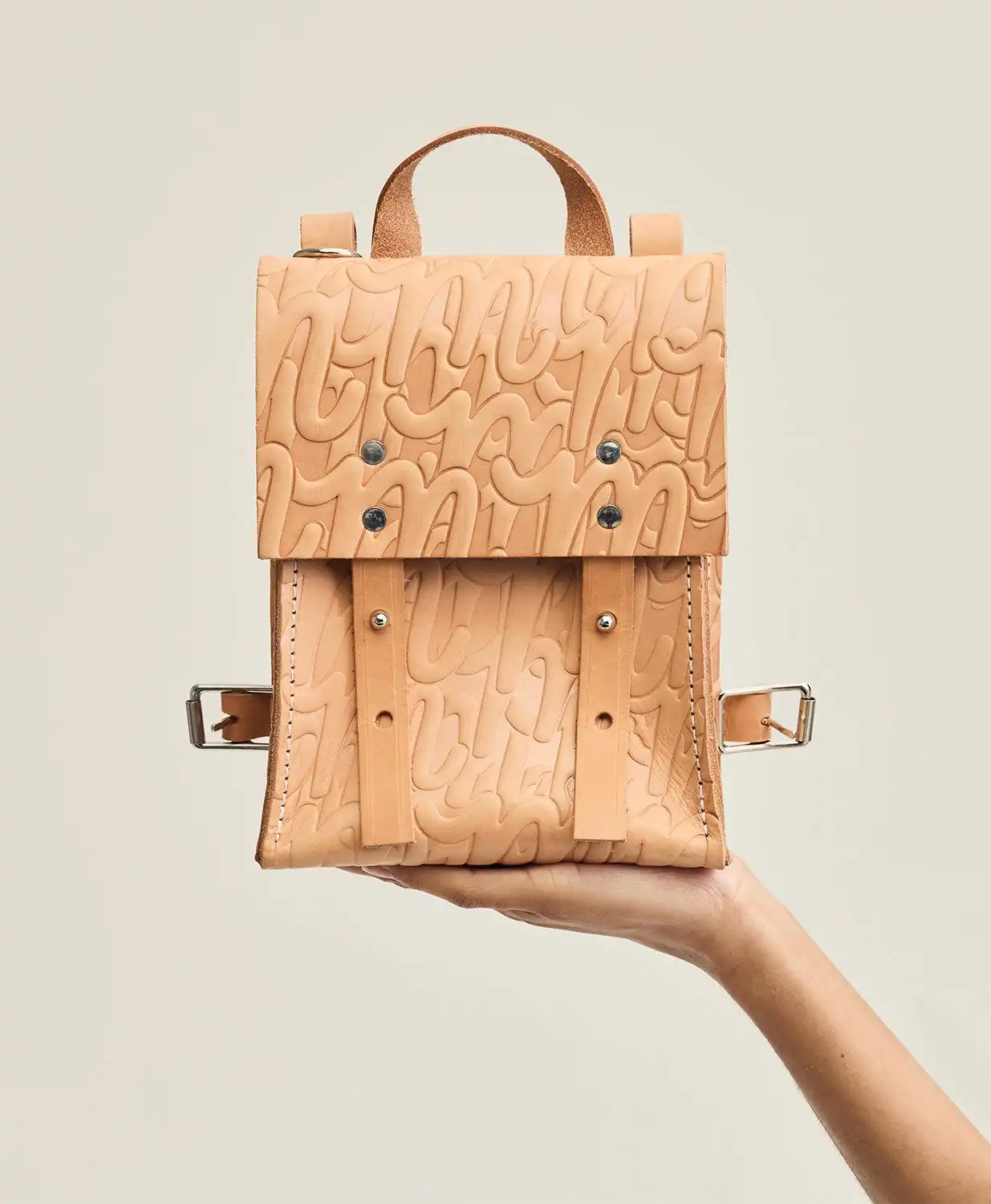 Single fresh lemon isolated on clean yellow backdrop