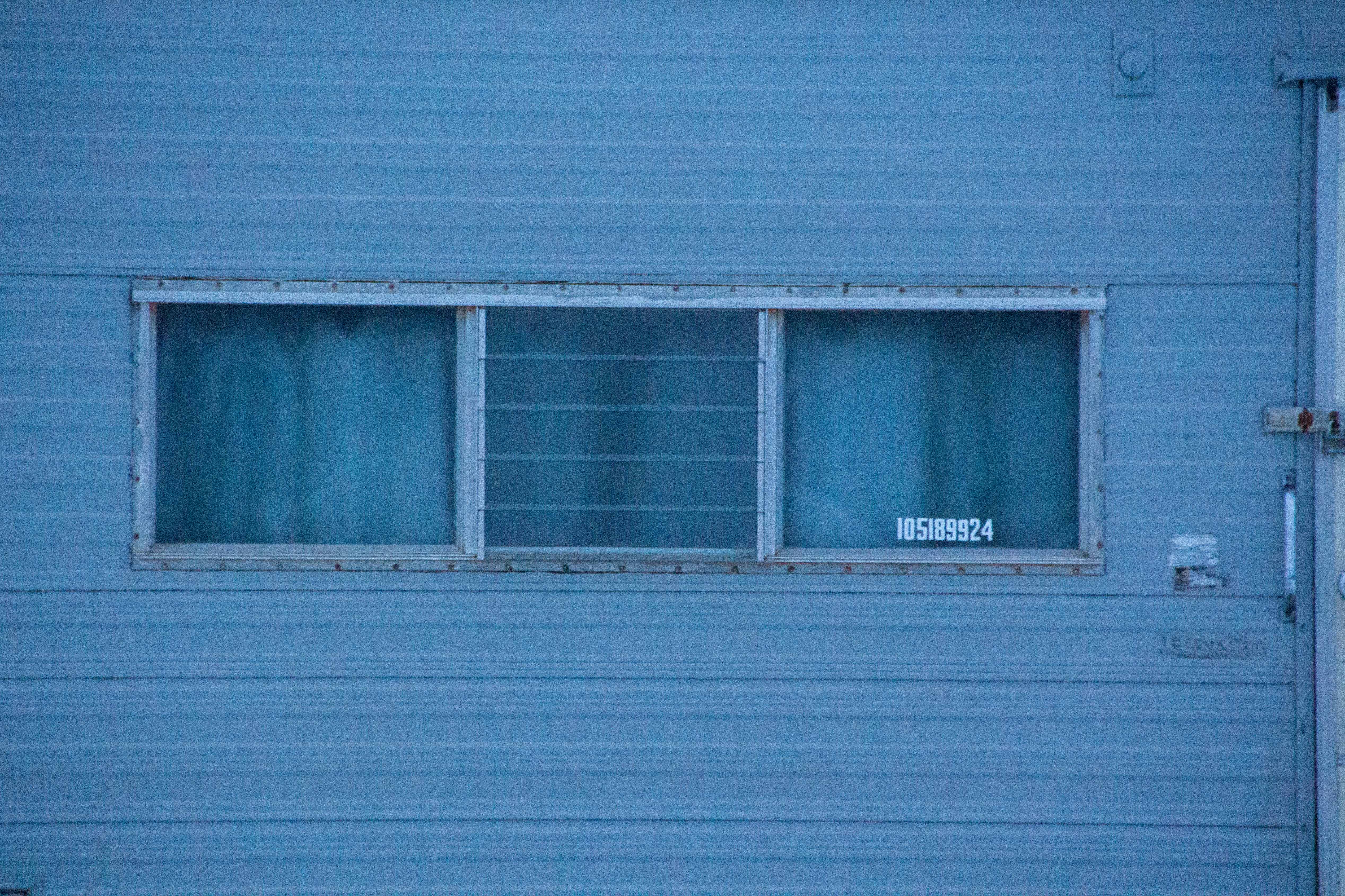 A studio space showcasing large window and contemporary design elements