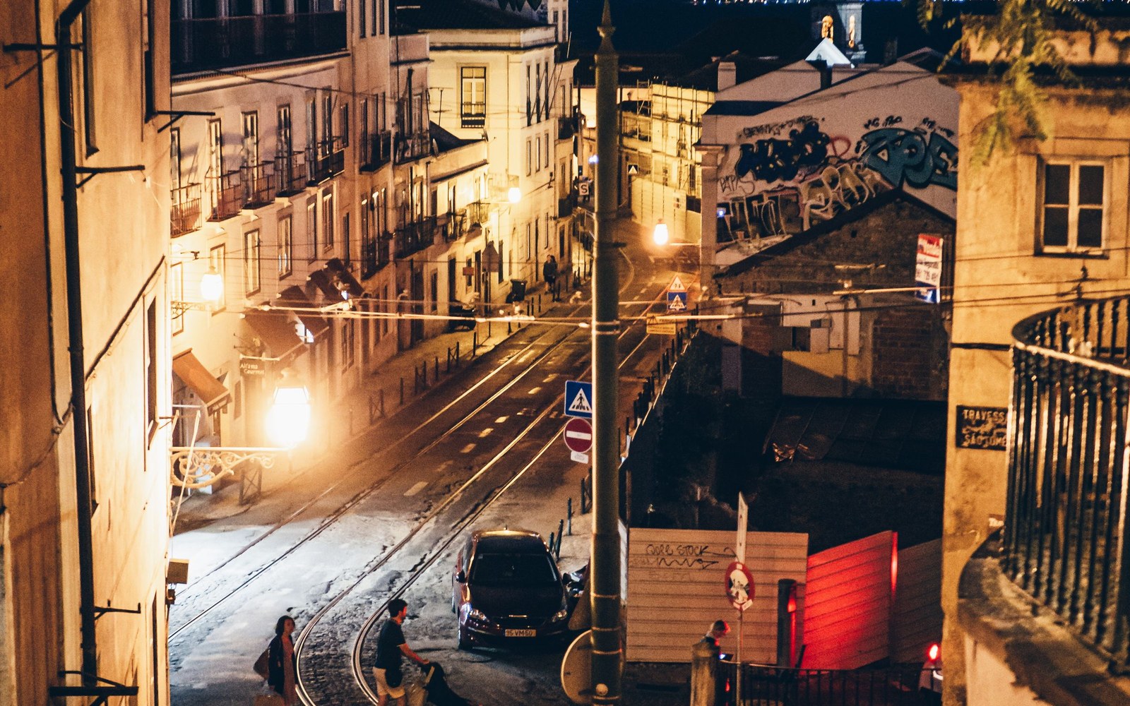 Lively Lisbon street after dark