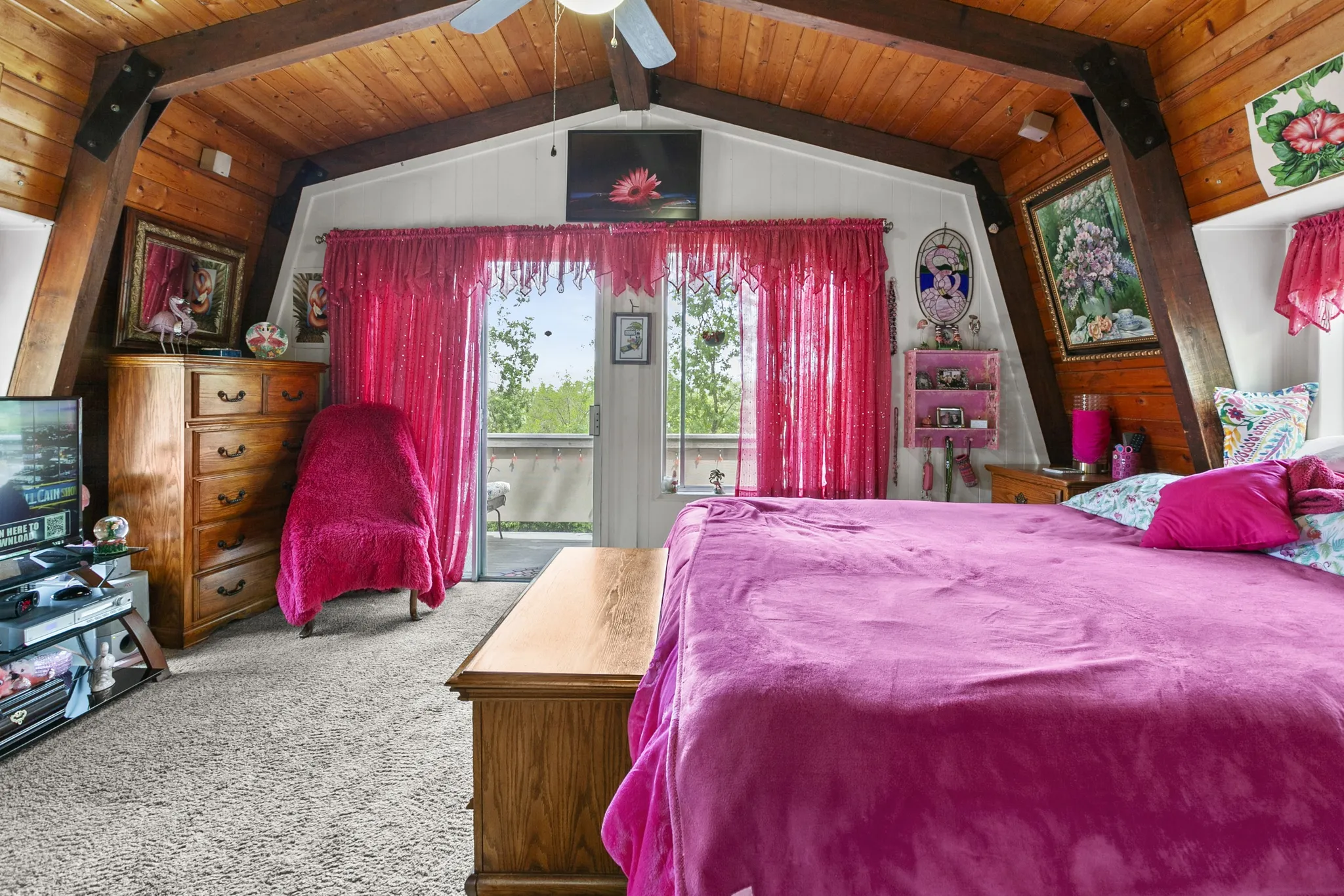 The front yard of the house with a garage