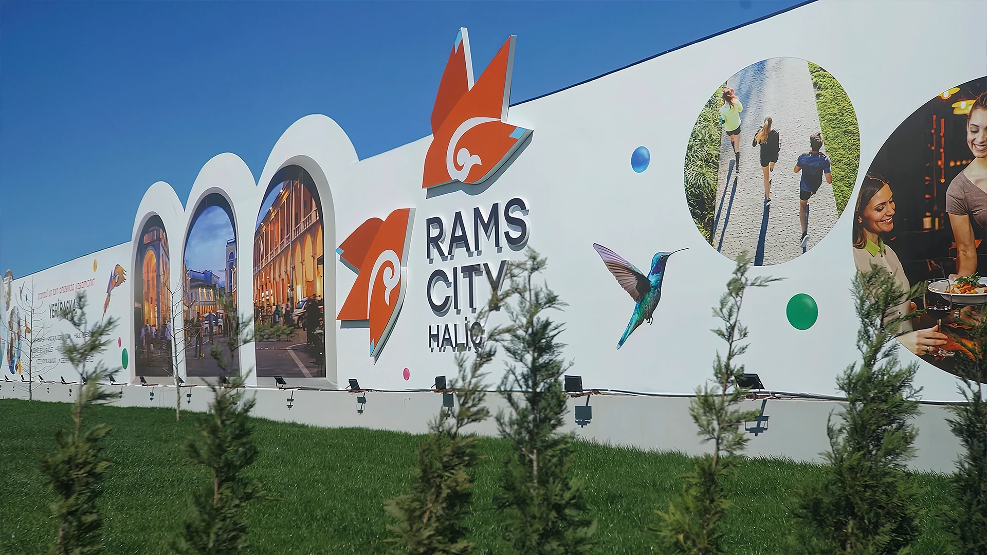 Graphic facade mural introducing the project’s visual identity