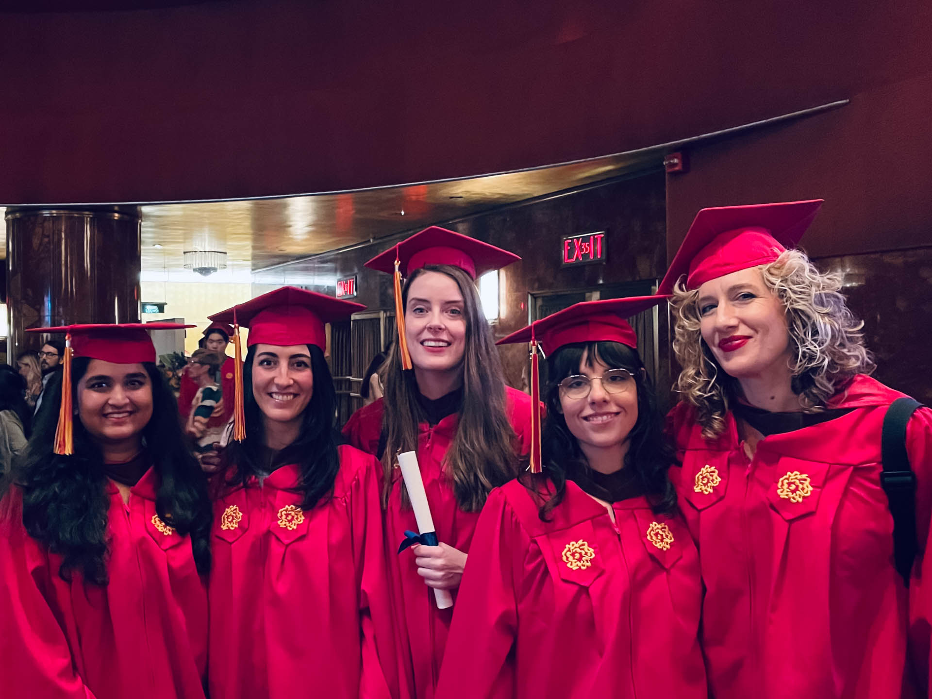 students in caps and gowns at Radio City Music Hall