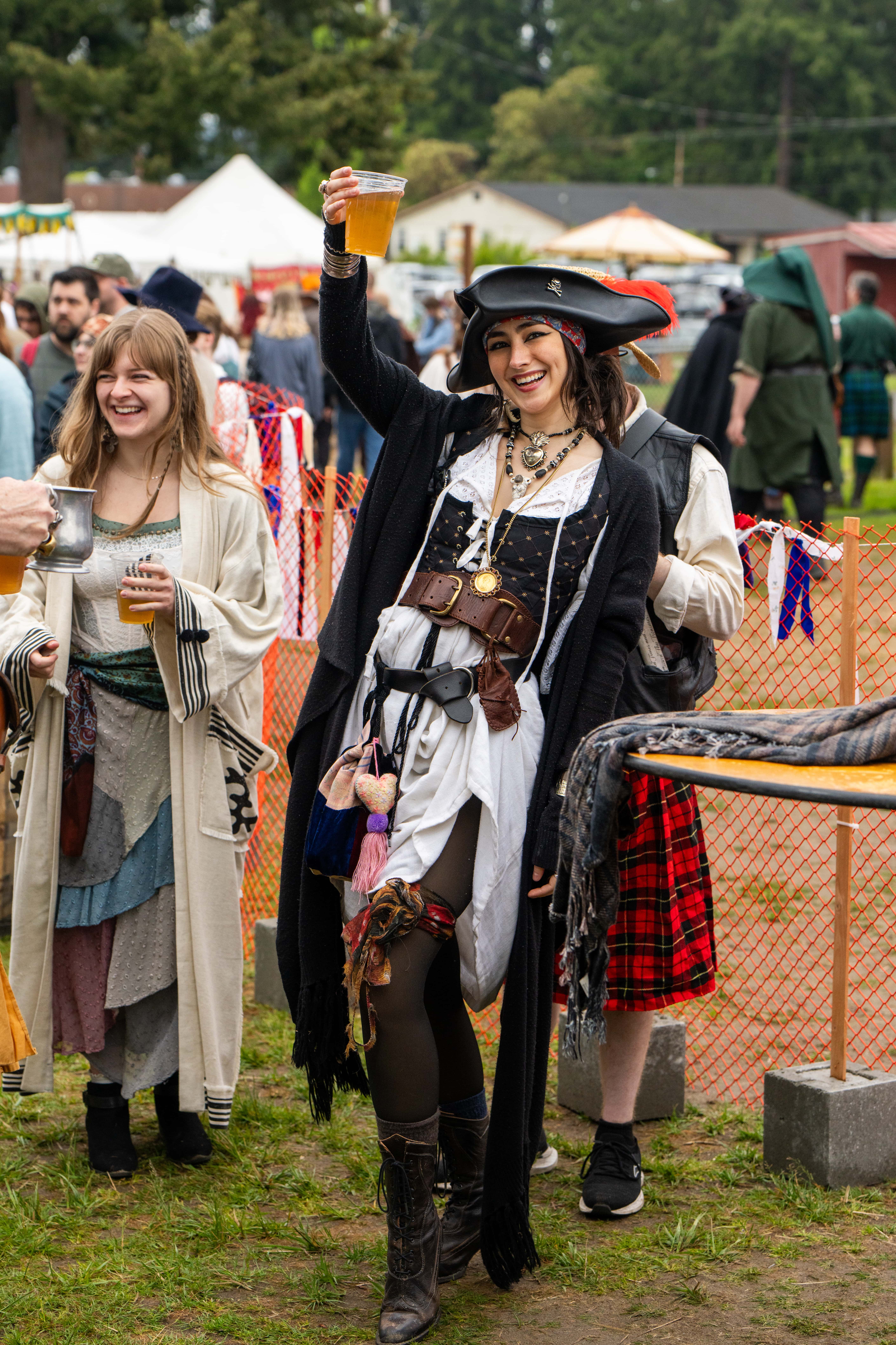 WRF guest holding a beer and giant smile