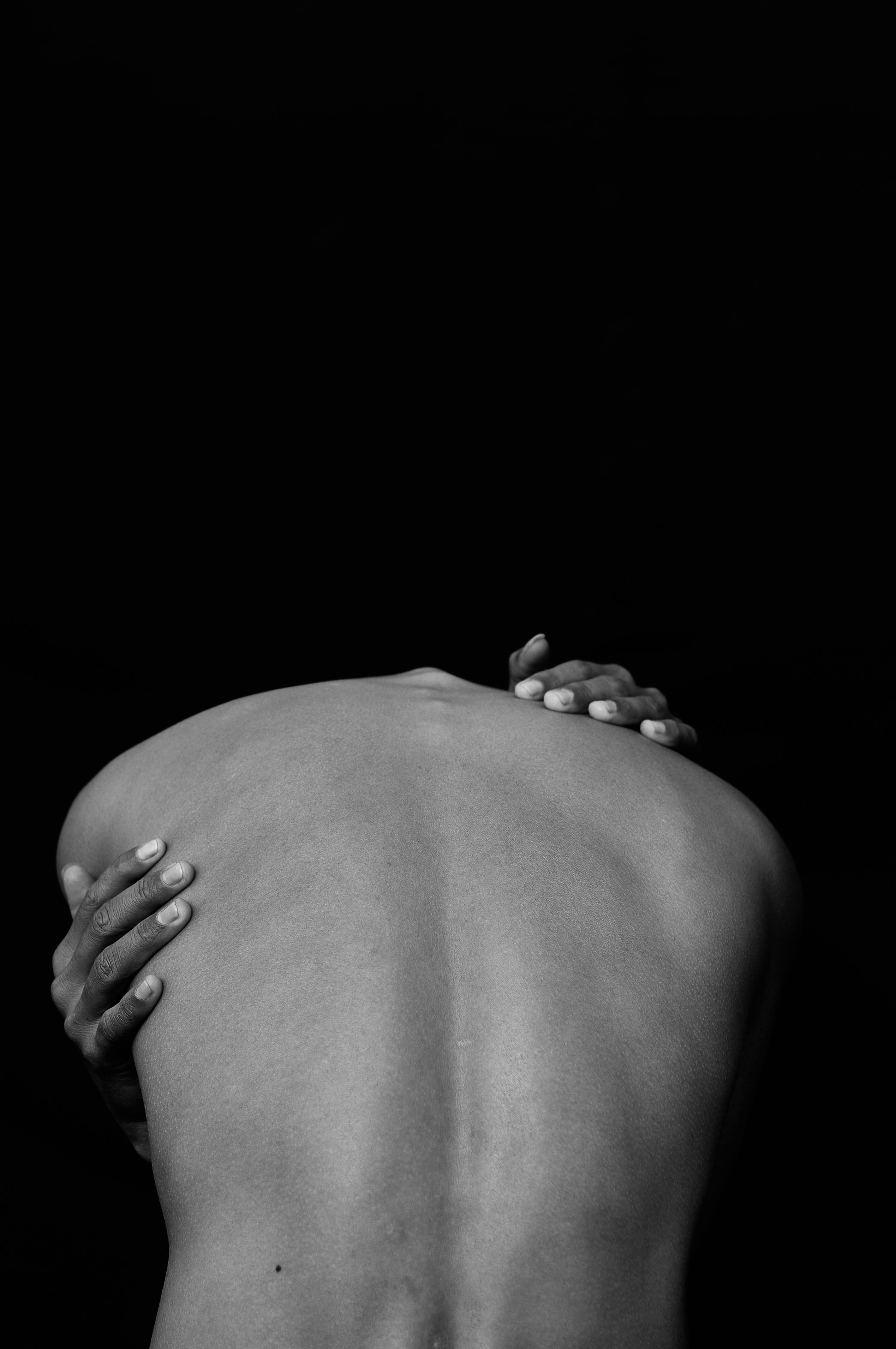 a woman with her hand up in the air