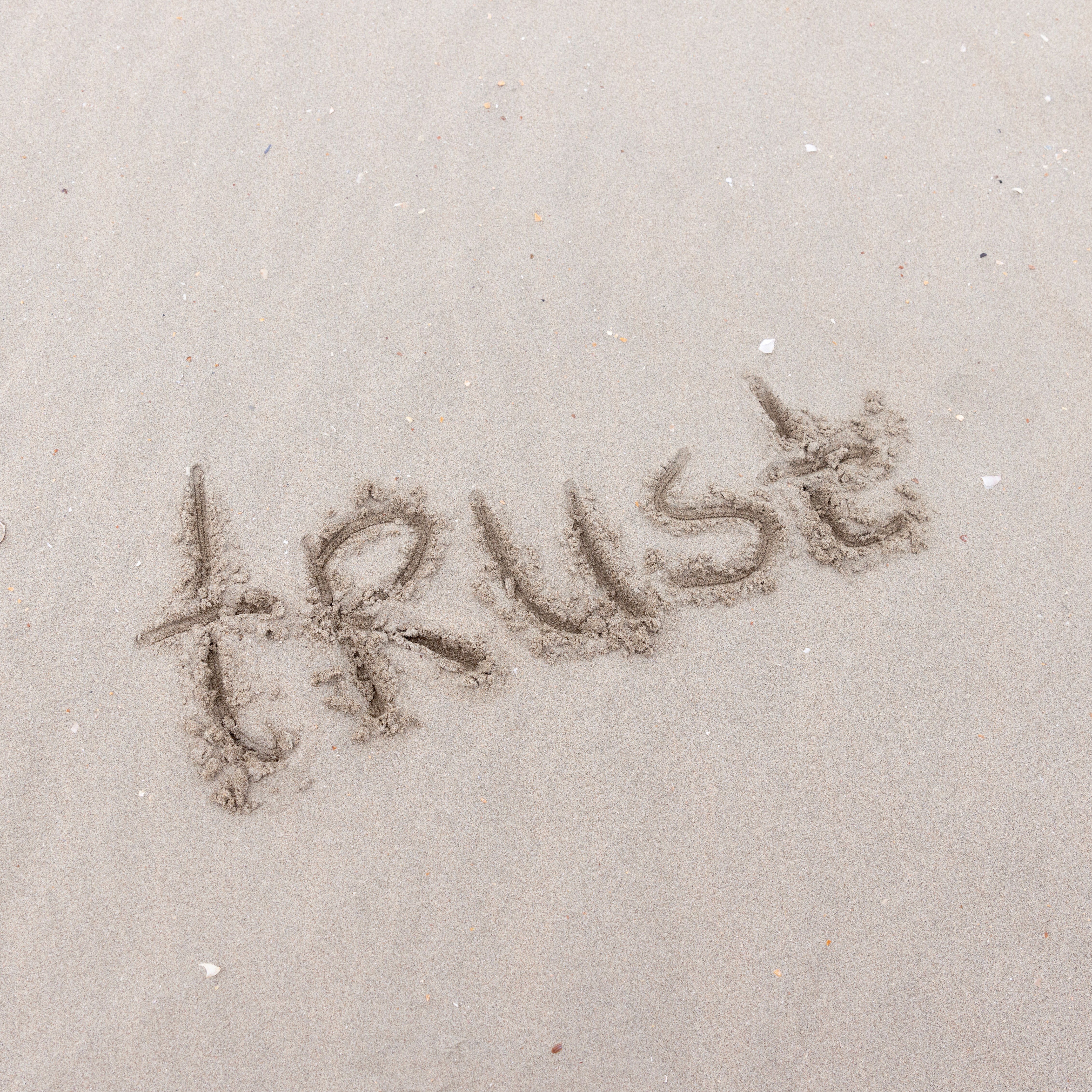 foto trust in het zand