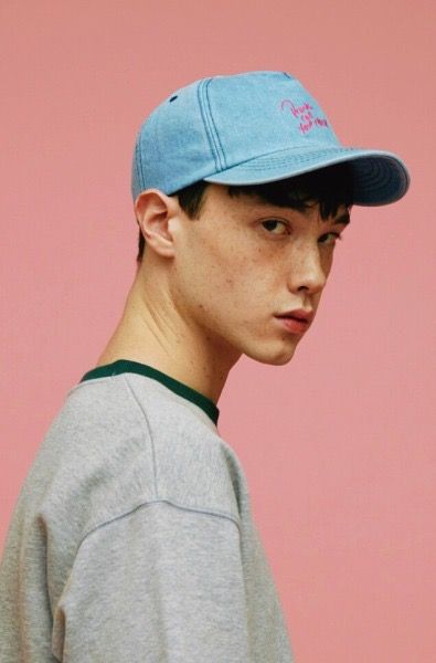 A photo of boy in cap