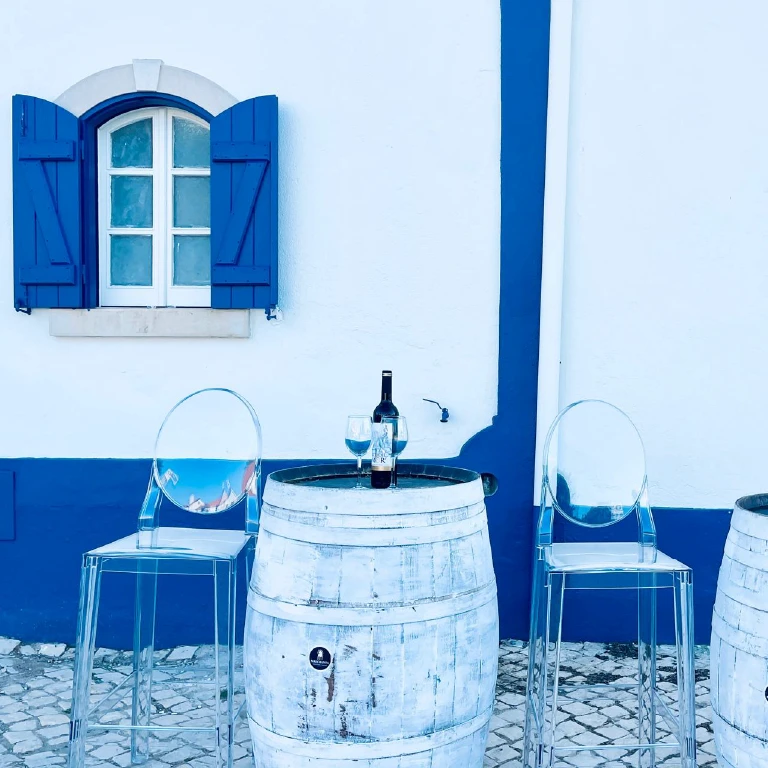 An aerial view of a farm land with a road running through it