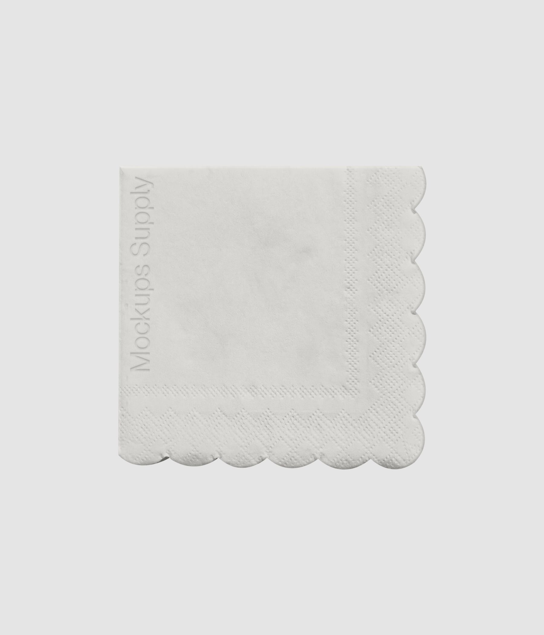 Tissue paper packaging mockup with scalloped edge and subtle debossed text
