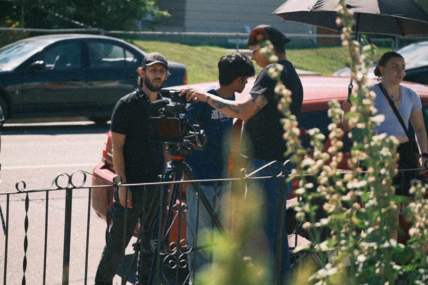 a woman holding a red flower