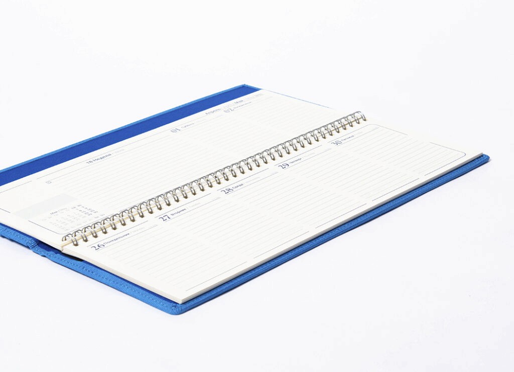 Slim spiral bound desk planner premium corporate stationery