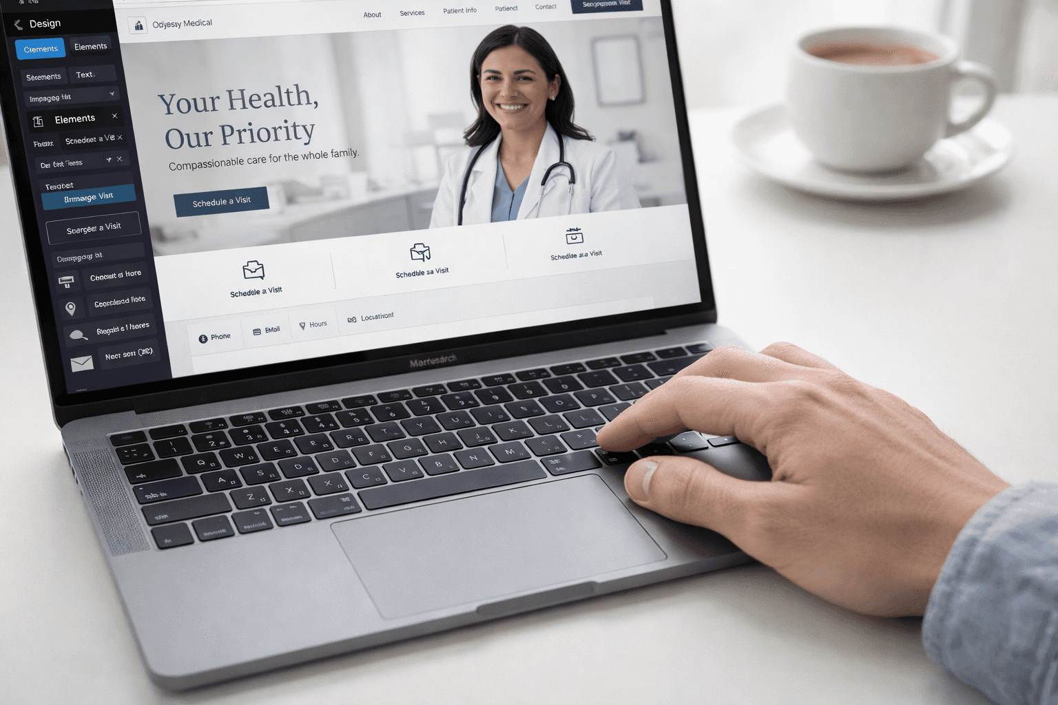 Designer updating a medical practice website on a laptop