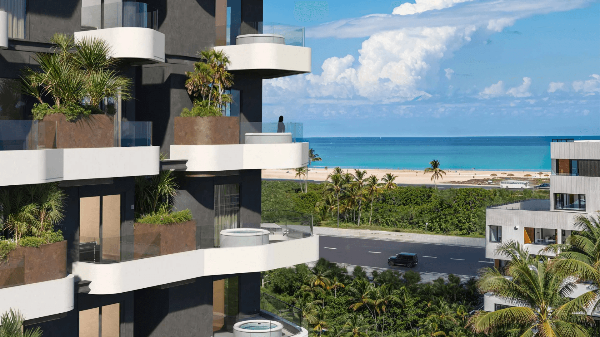 Marea Residences, a towering building with a lush rooftop garden, creating a green oasis in the city skyline.