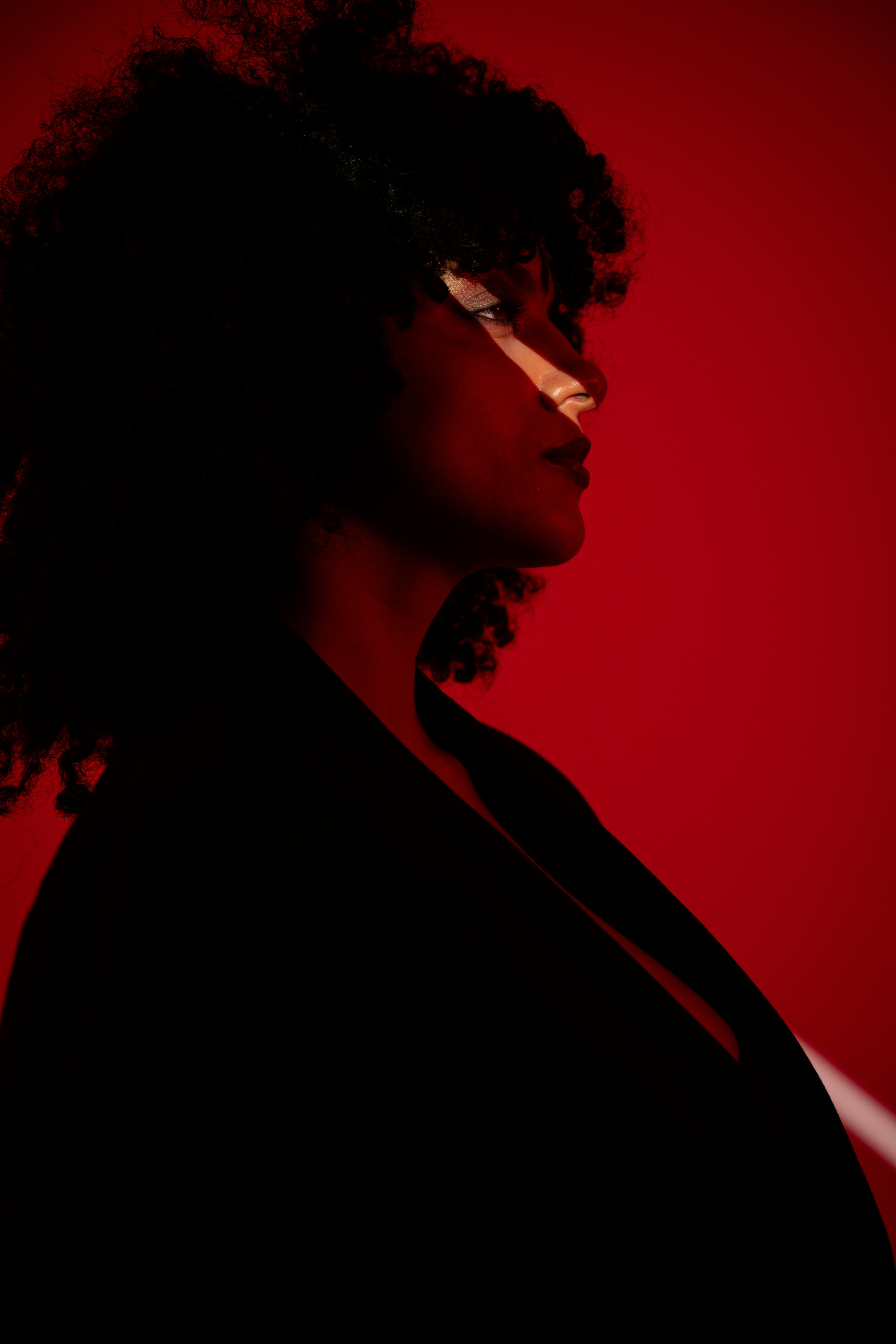 Woman portrait on red background