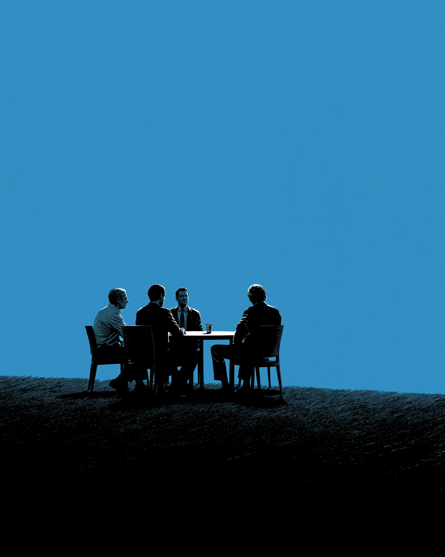 group of business men sitting at table