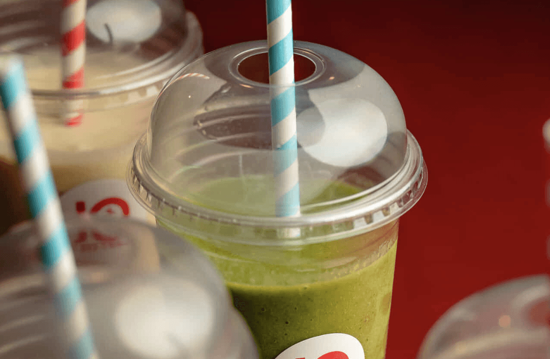 Green smoothie in a takeaway cup from Jo & The Sisters healthy breakfast bar in Split