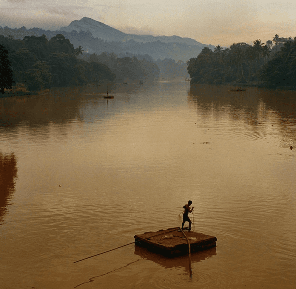 a group of women standing on top of a sandy beach