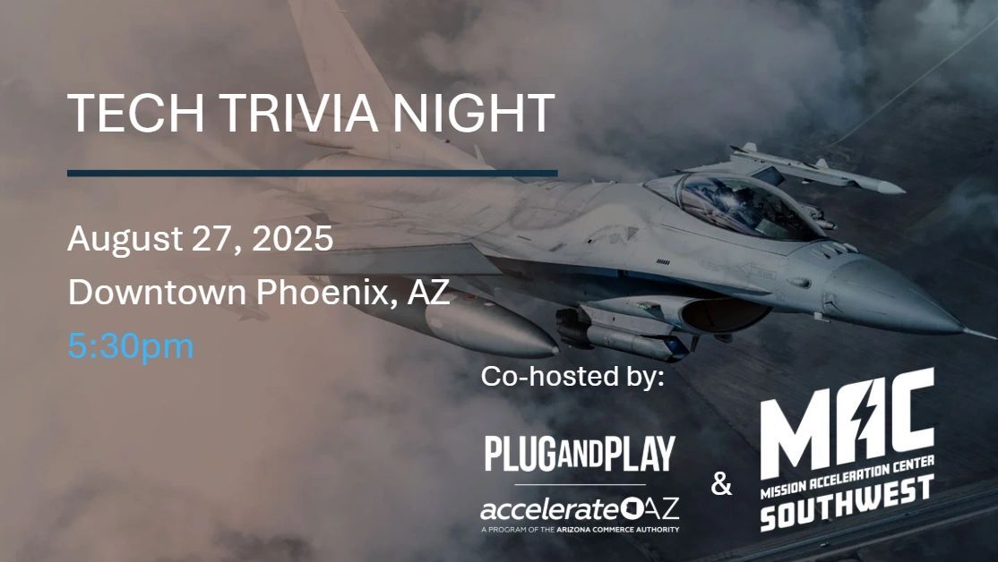 a black and white living room with a large tv