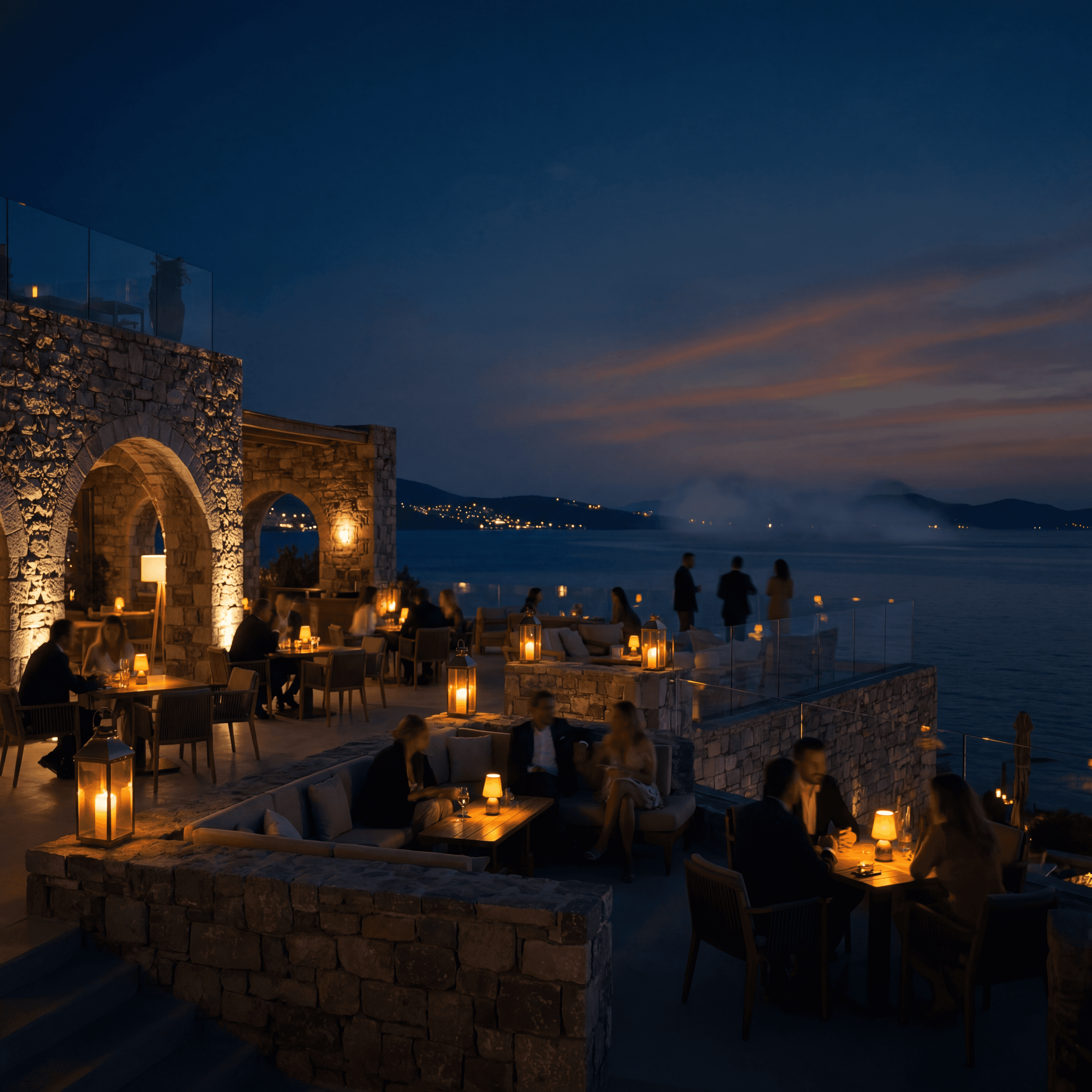 Luxury restaurant in Bodrum at night with terrace dining and Aegean sea views