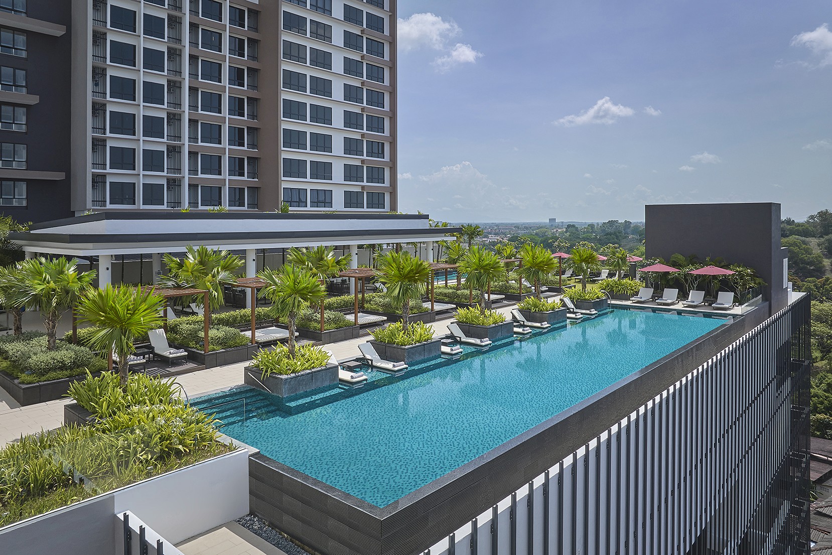 Pool view of Courtyard by Marriott & Apple 99 Suites project by Asima Architects