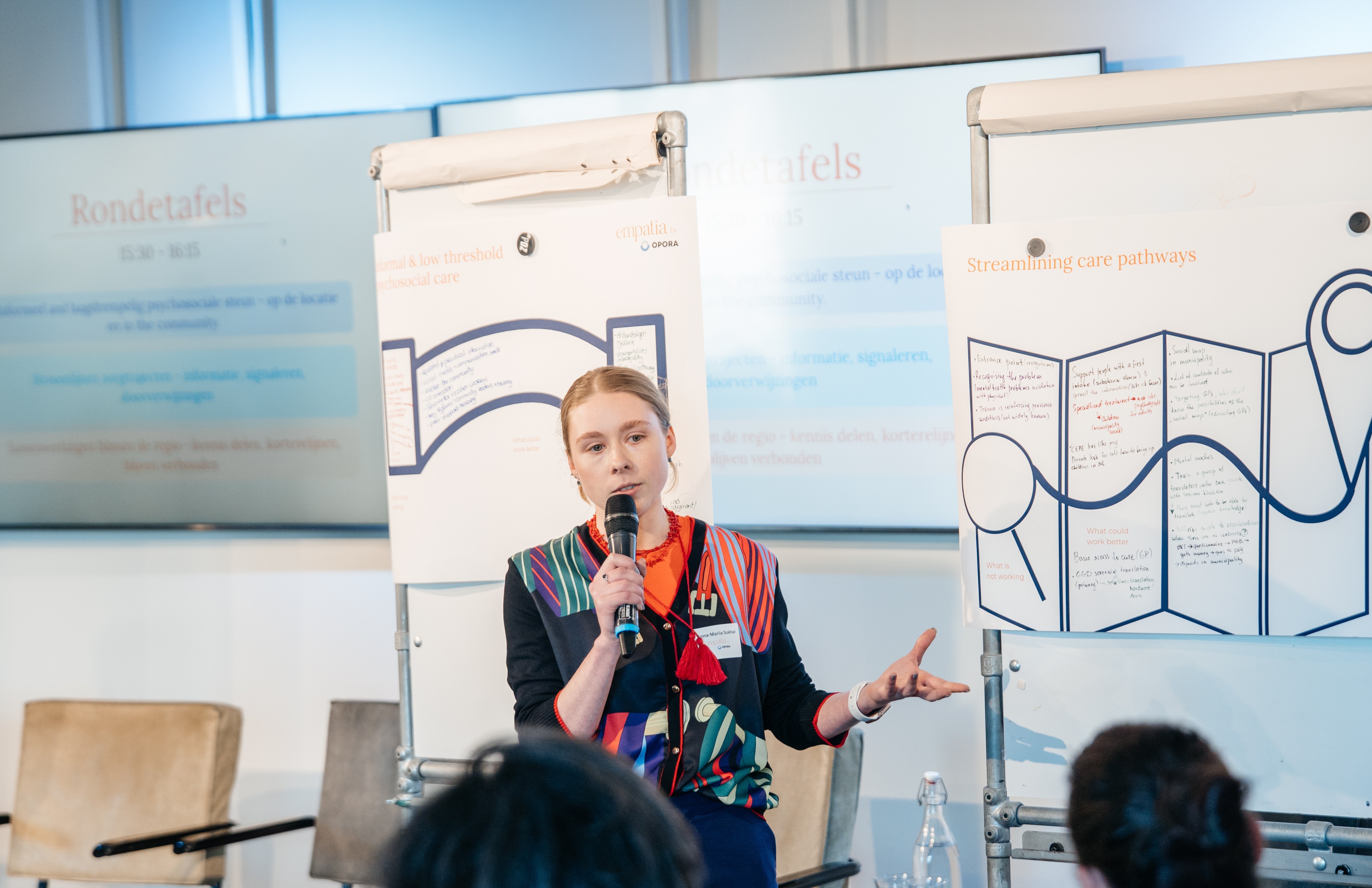 Psychologists attending a lecture in a hall — Empatia professional development and training sessions, courses, and workshops for working in the Netherlands.