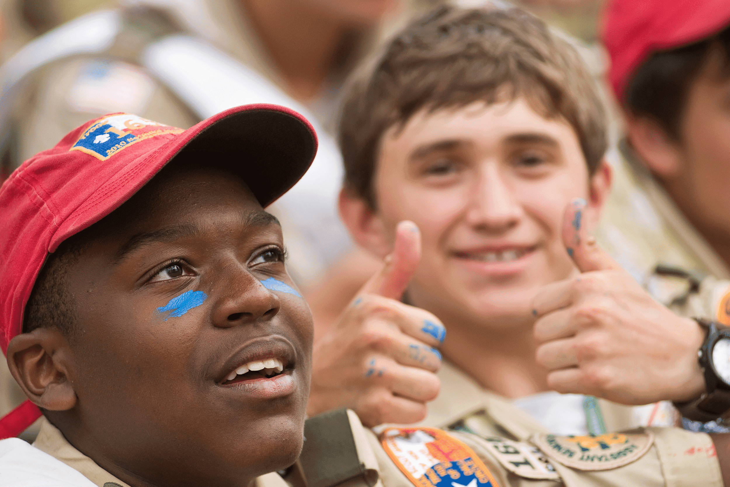 Boy Scouts 100th Anniversary National Scout Jamboree scouts with face paint smiling