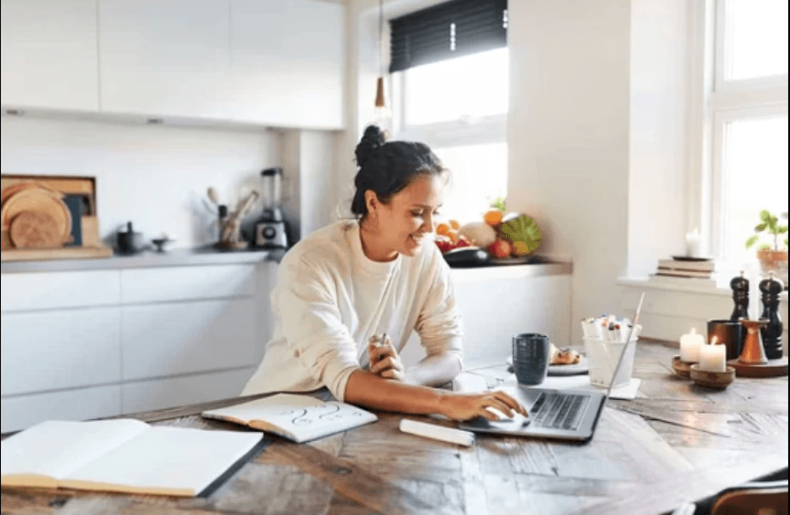 Warm in-home technology help at a kitchen table