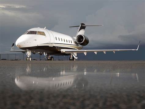 The Bombardier Challenger 604 is a mid-size, wide-body business jet with a range of 4,055 nautical miles and the ability to carry up to 19 passengers.      It is powered by two General Electric CF34-3B turbofan engines and has a cruise speed of 460 knots. The aircraft has a spacious cabin with a height of 6 feet and 1 inch, a width of 8 feet and 2 inches, and a length of 28 feet and 5 inches.      The cabin can be configured with various layouts, including a forward galley, a club seating arrangement, and a full-size lavatory.      The cockpit is equipped with a Honeywell Primus 2000XP avionics suite, which includes a digital flight control system, weather radar, and dual navigation and communication systems.      The Challenger 604 has a maximum takeoff weight of 48,200 pounds and a service ceiling of 41,000 feet.      It is popular among both private individuals and charter operators for its versatility, reliability, and long-range capabilities.