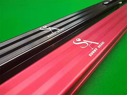 sunny akani aluminium cue cases on a snooker table