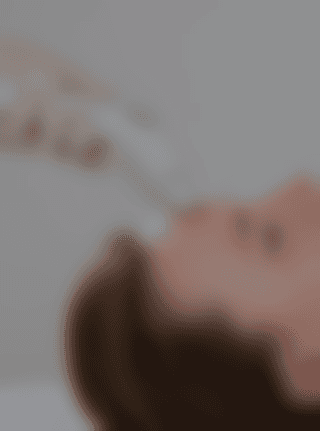 A man with surfboard at beach