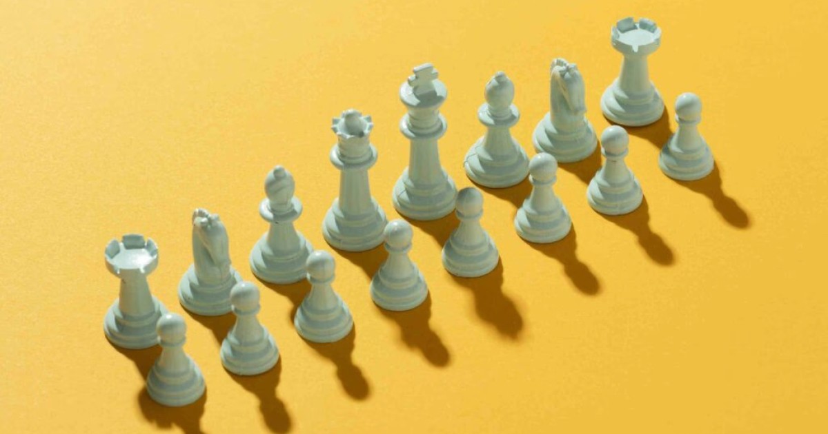 White team chess on a yellow background