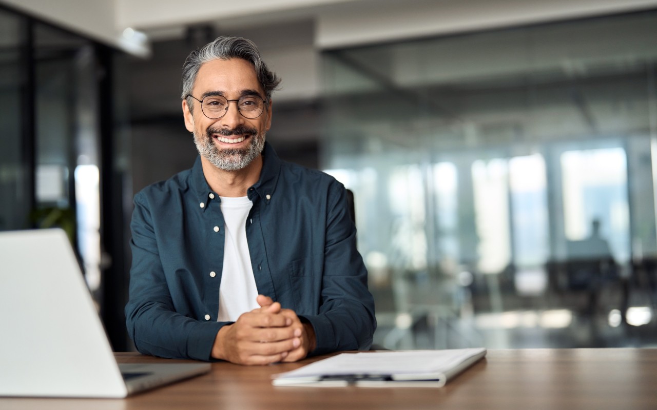 A manager behind his laptop.