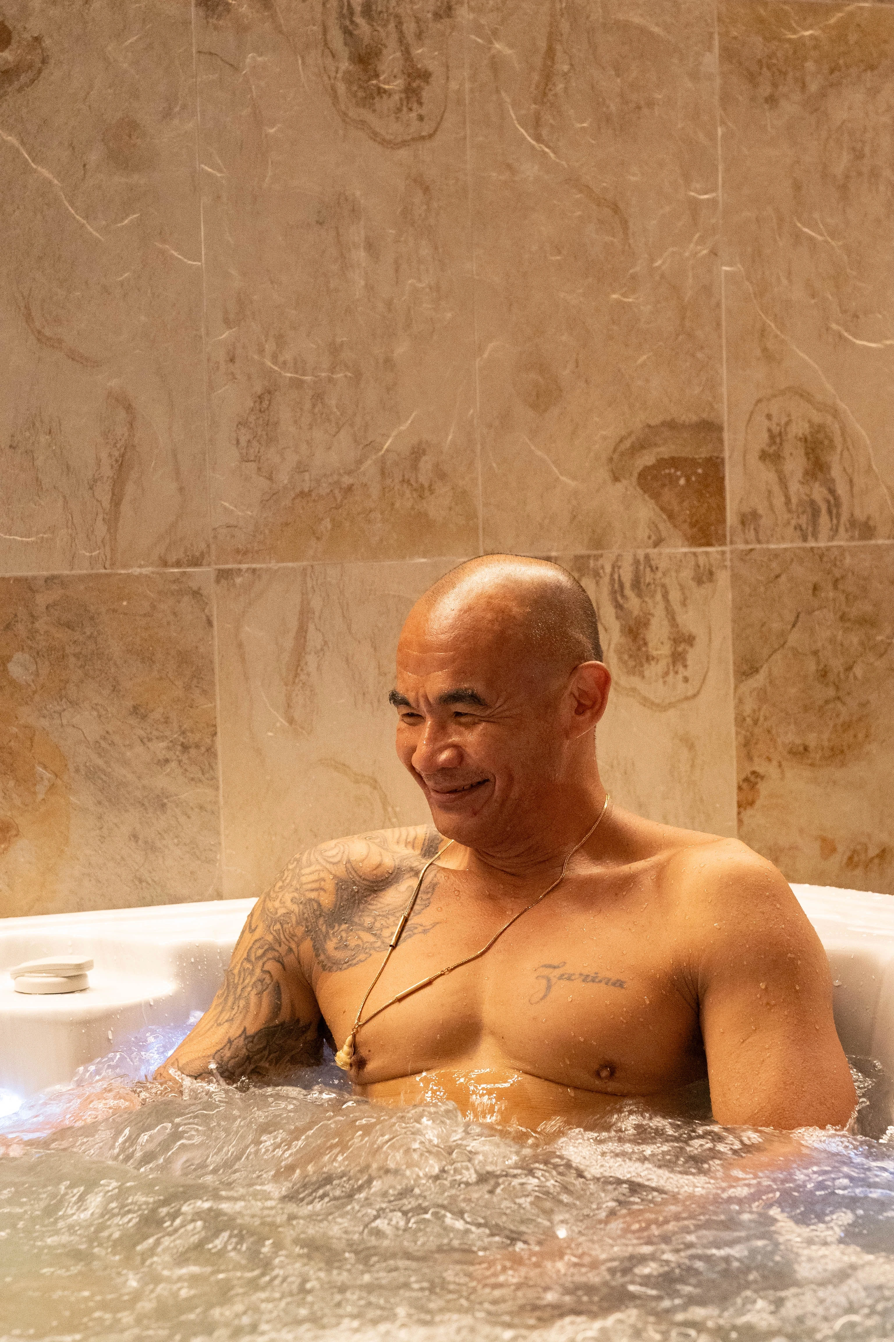 Man is relaxing in a hot sauna.