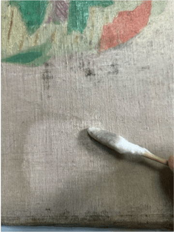 person making a contactless payment with a card