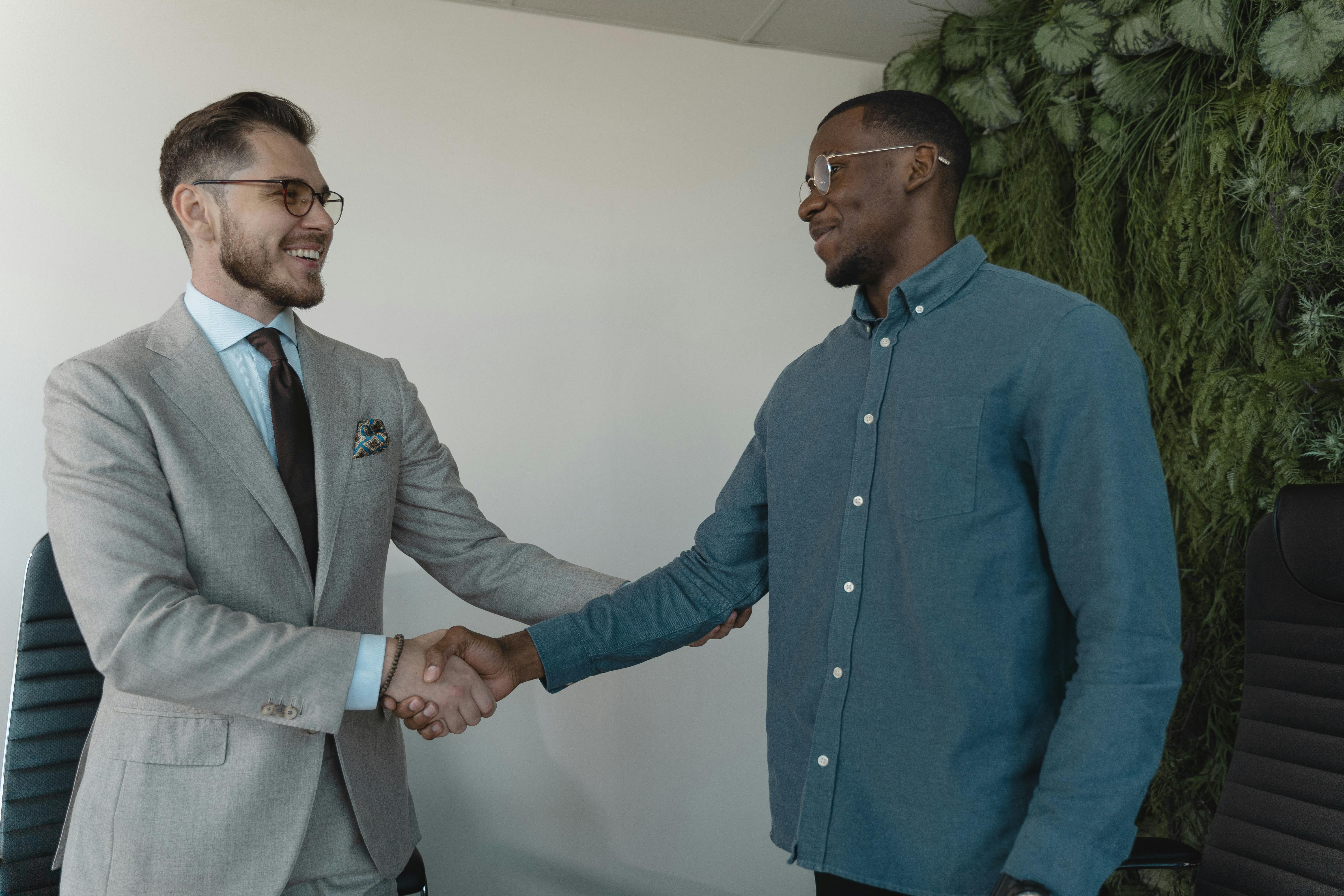 A man having a deal with a buy-to-let mortgage broker