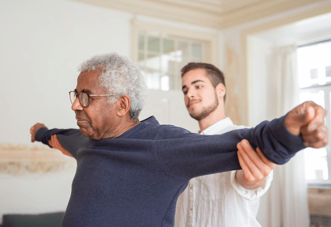 Caregive helping Old Man for an In-home service