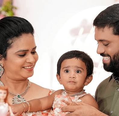 Modern building with repeating balconies and blue tile accents