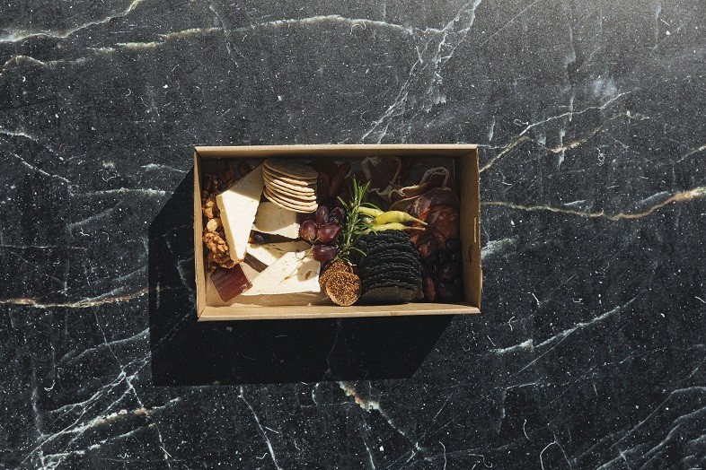 Someone checking items off of a check list