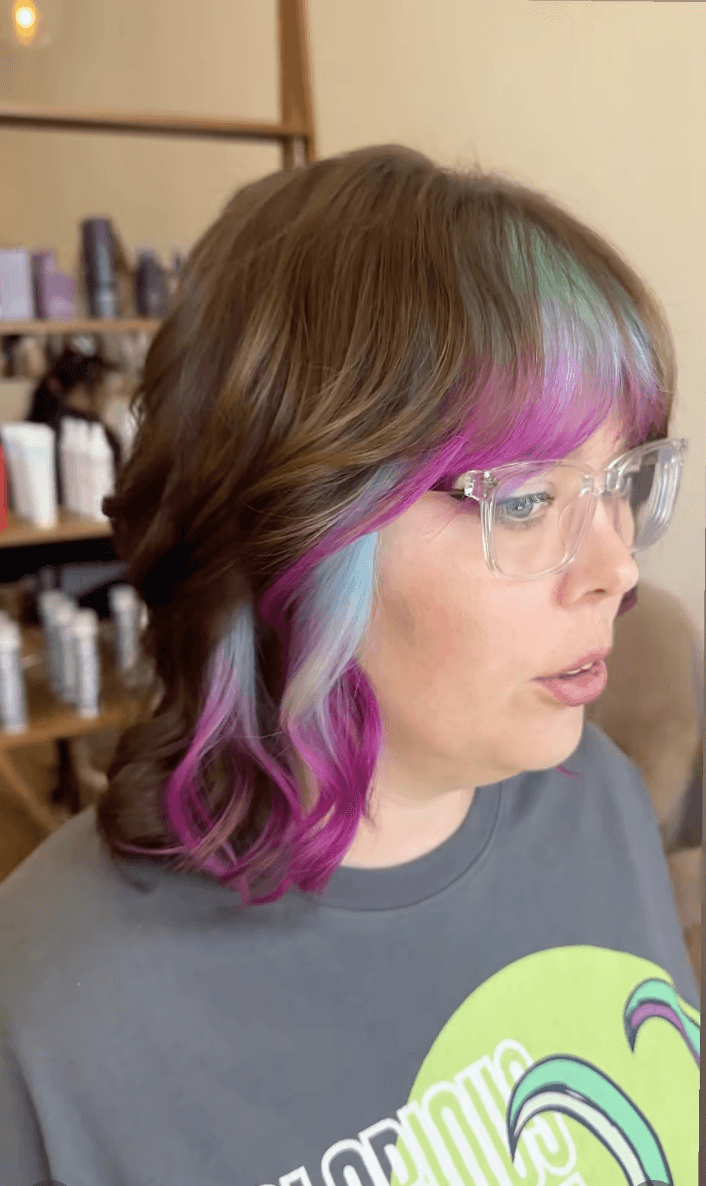 Teal to pink vivid color melt by Marlie Allen at Del Sol Hair Studio Huntington Beach