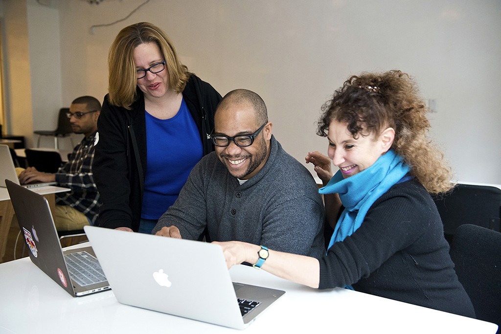 A designer mid-process, surrounded by ideas and in a state of productive momentum.