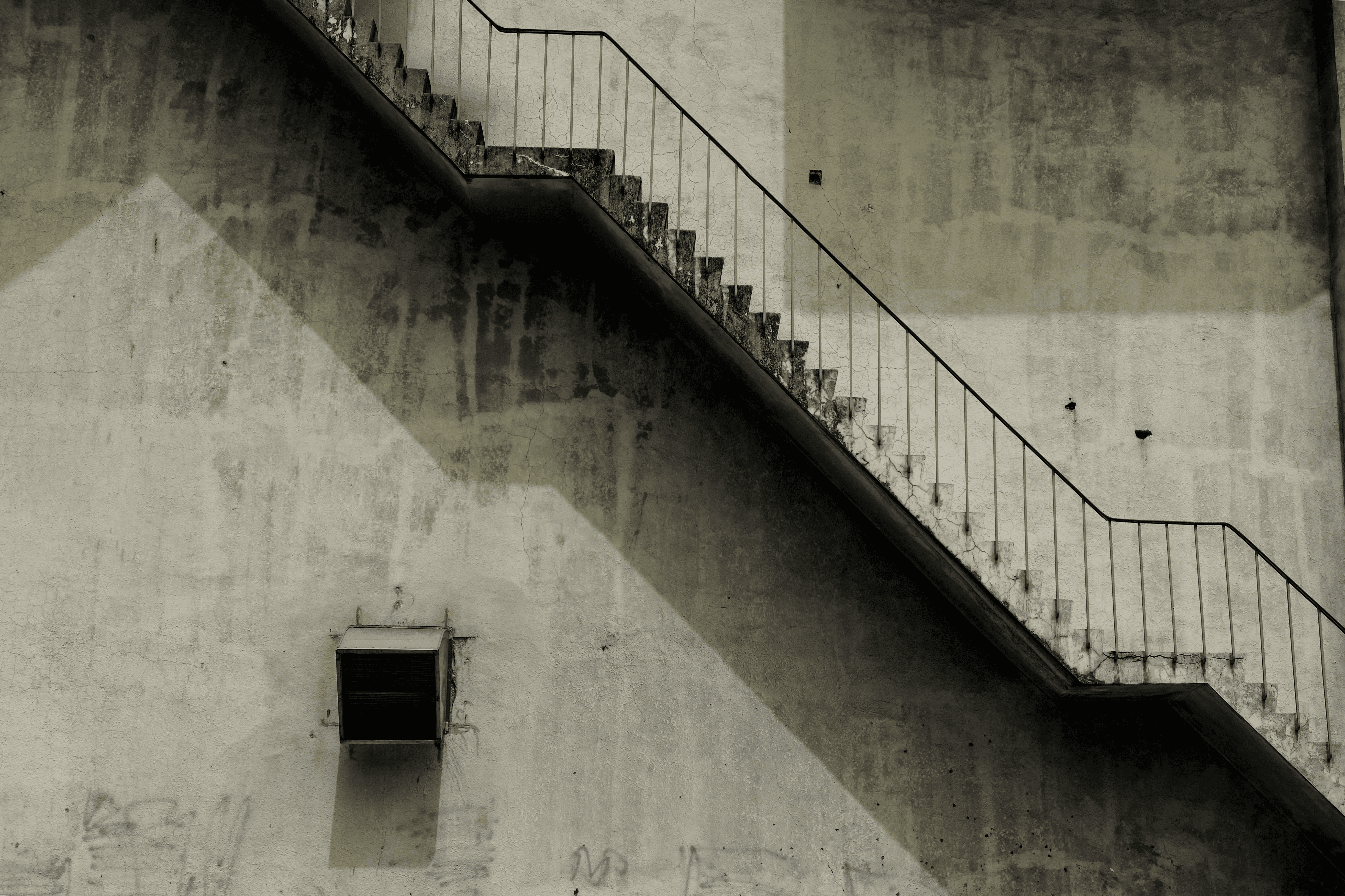 Cinematic wide shot of concrete stairs with motion-blur texture, used as the hero banner for Konvex Studios’ services.