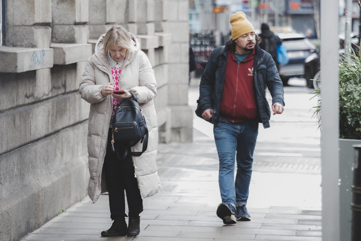 Couple walking through a European old town while traveling