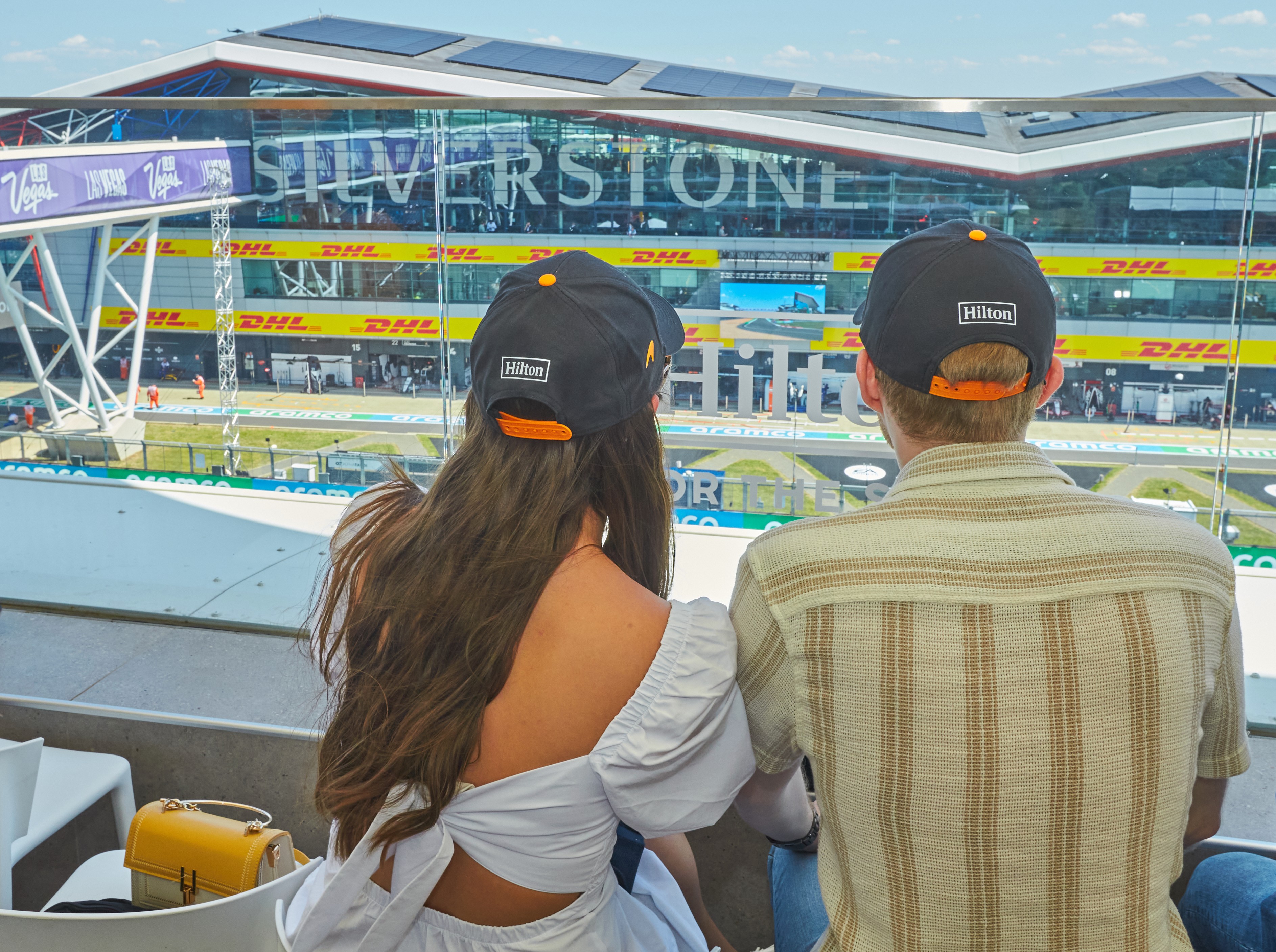 Hilton guests in hospitality suite watching British Grand Prix - Luxury Event Photographer