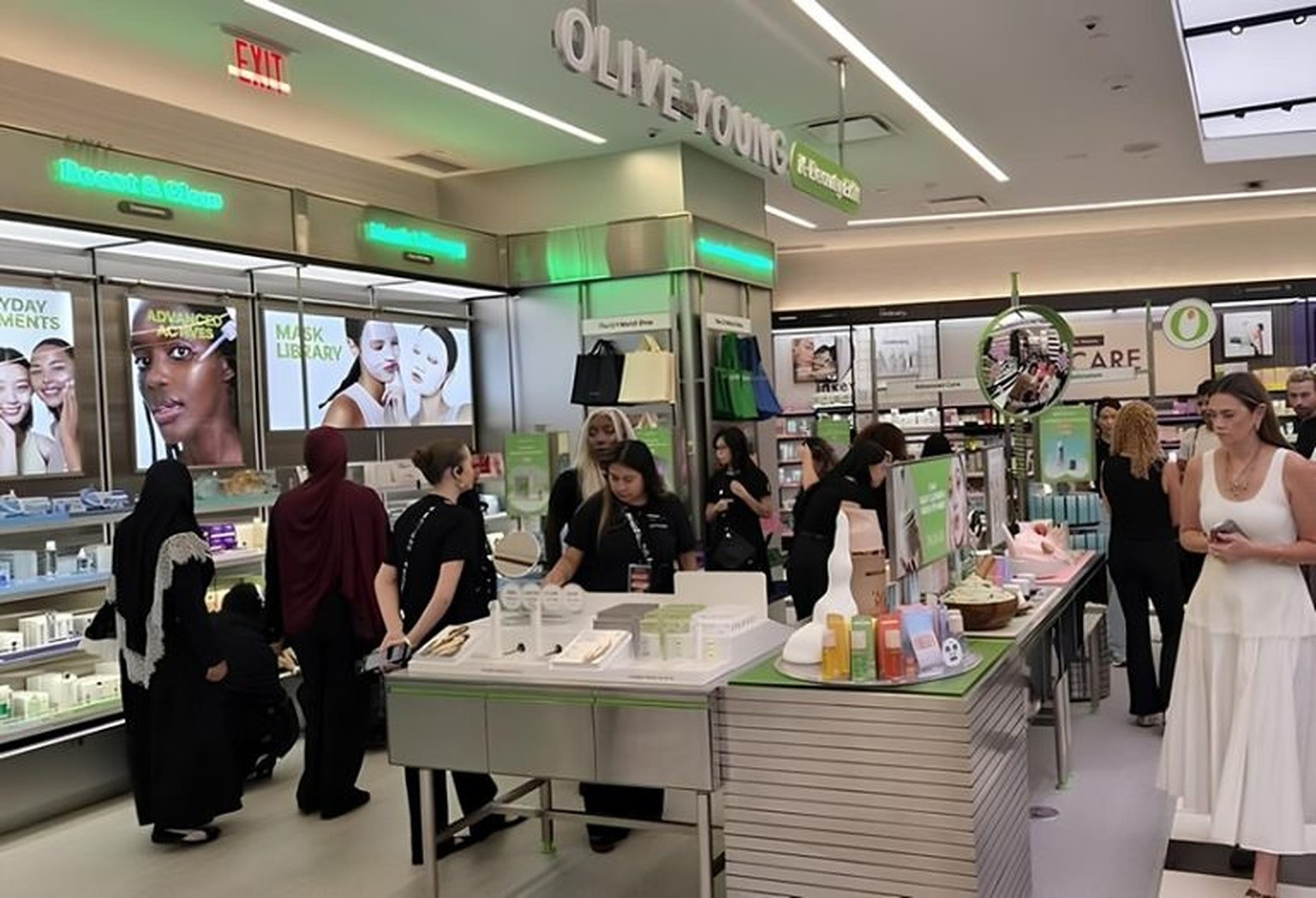 Shoppers browsing the OLIVE YOUNG K-Beauty Edit inside a US Sephora store