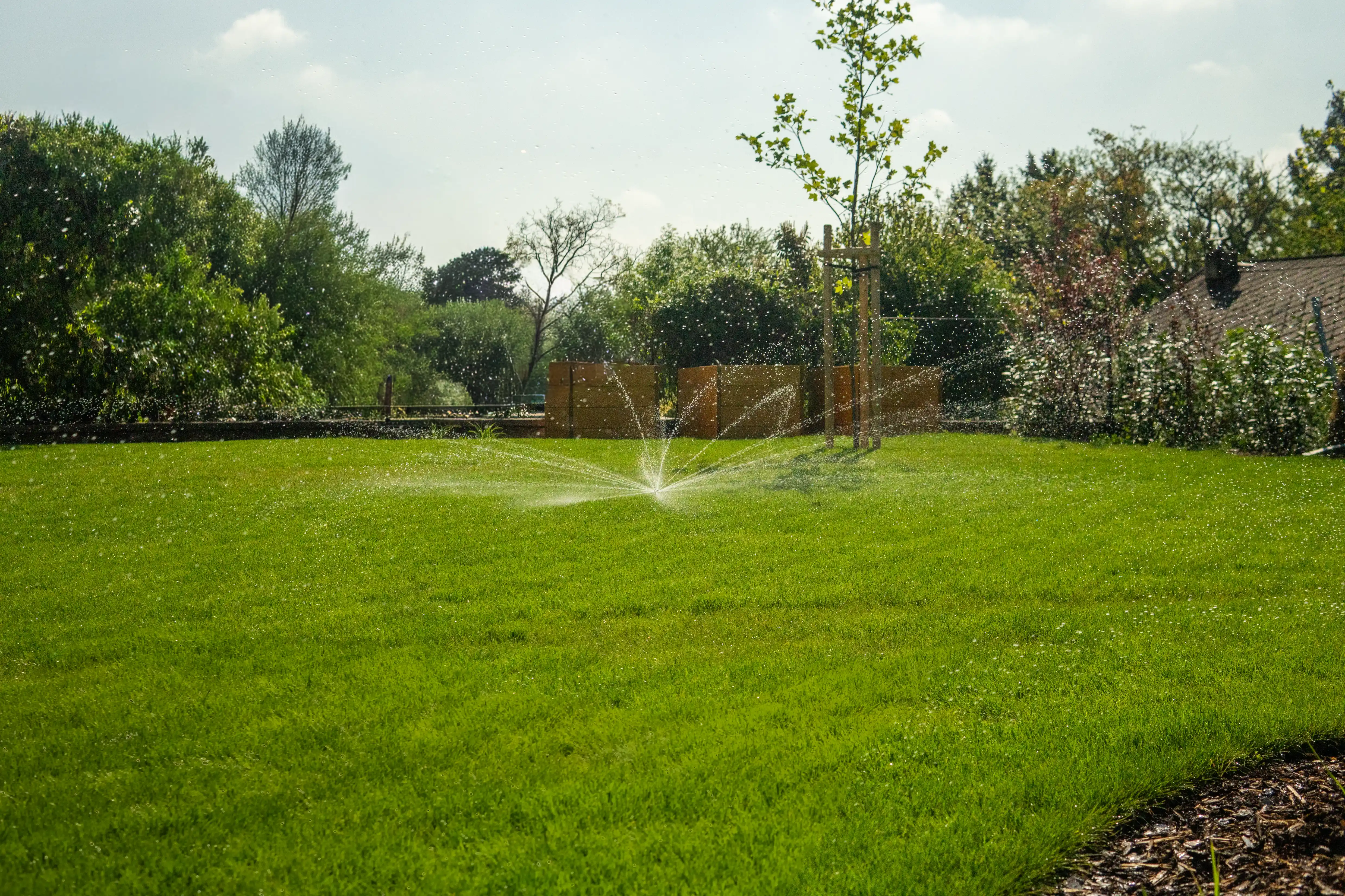 Beautiful landscaped garden with greenery and outdoor design elements.