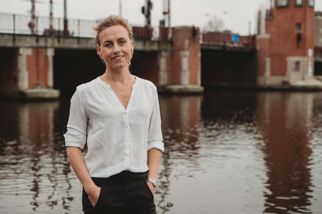 Nicola Ebmeyer posing near canal and bridge