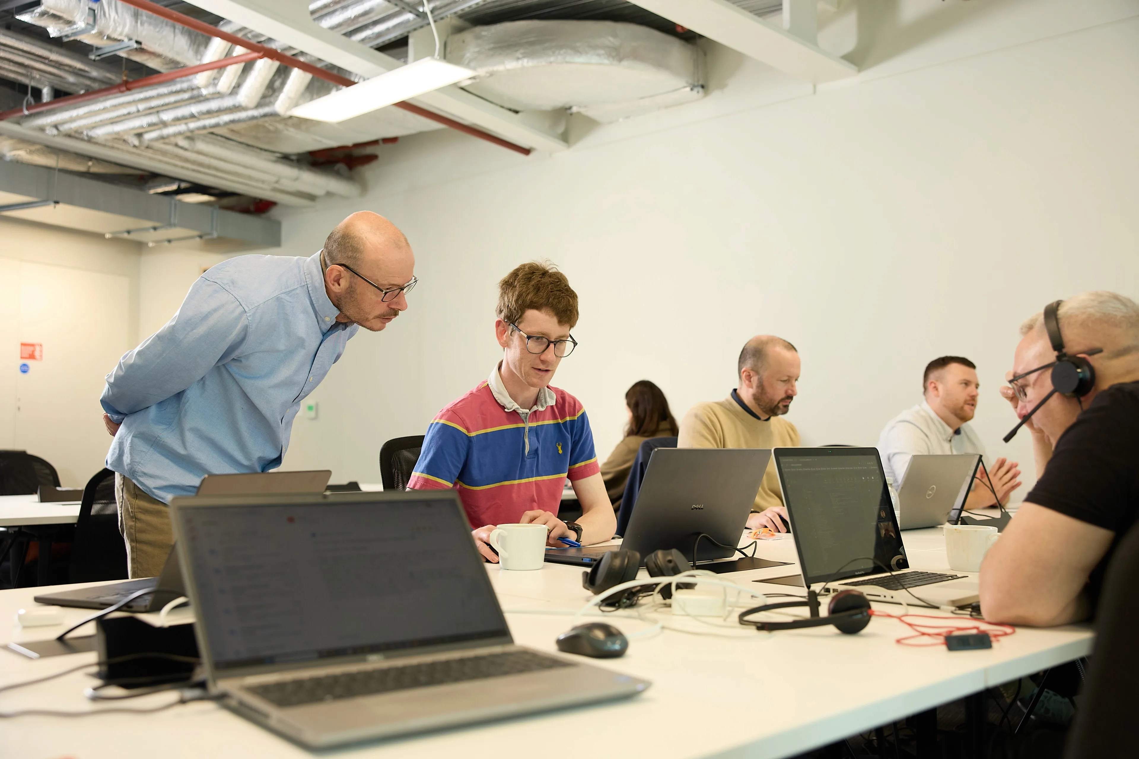Kyckr team members collaborating in an office